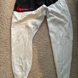 Nike Black and White Sweatpants with Tapered Cuffs